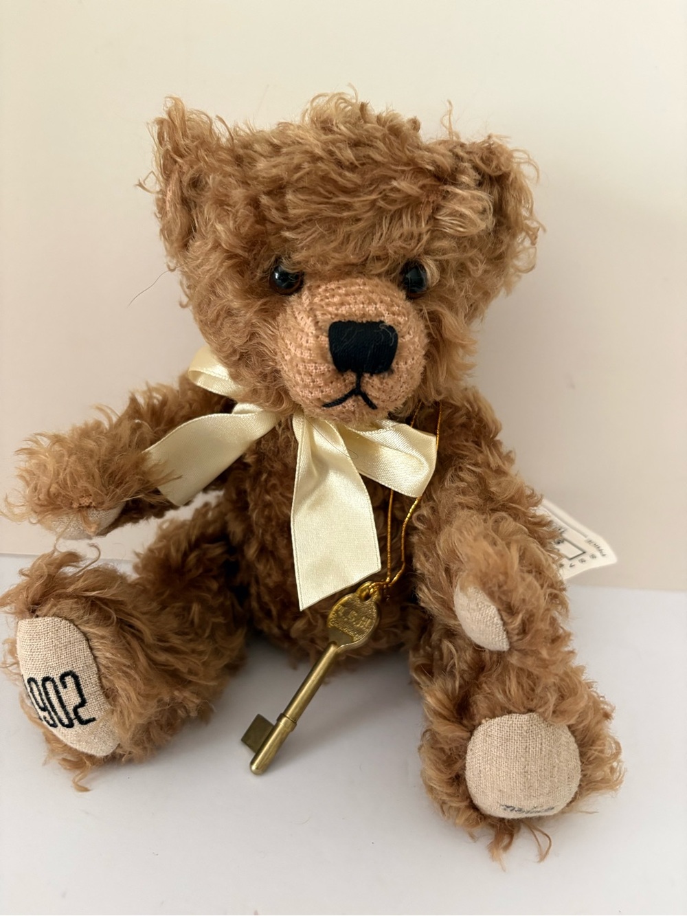 NWT RBI collectible  teddy bear. 100th Anniversary numbered w/key. 10 inch